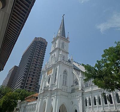 CHIJMES, an historic church in Singapore painted white with a tall tower